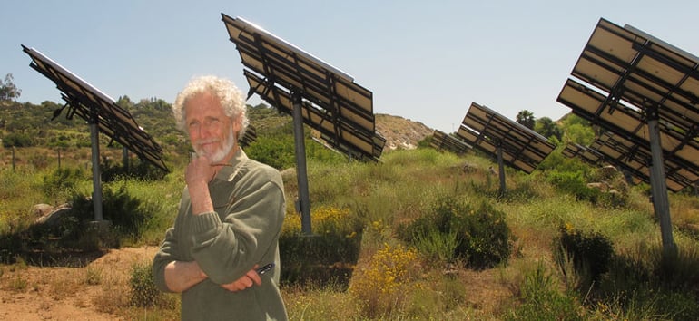 Mark Snyder in Front of Solar Panels